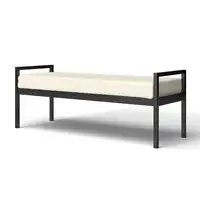 Photo of Modern Industrial Bed Bench with Black Metal Frame and Cream Upholstered Cushion