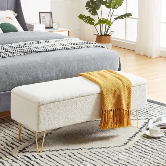 White Sherpa Fabric Upholstered End of Bed Storage Bench with Gold Finish Legs Photo 1